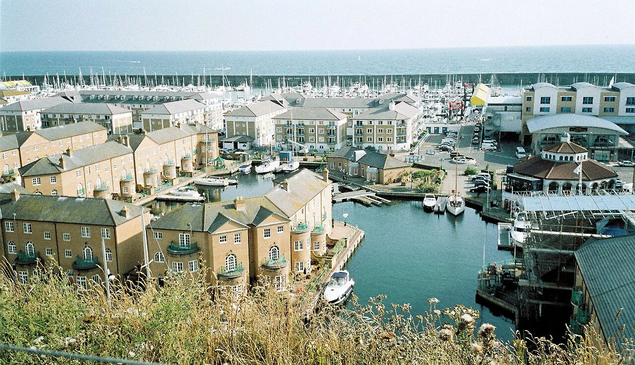 Brighton Marina inside its breakwaters below the cliffs