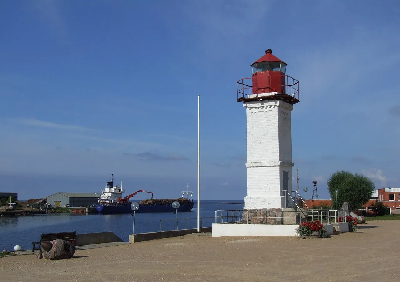 Salacgrīva lighthouse by the harbour at the mouth of the Salaca