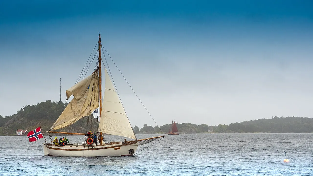 Grimstad harbour with old sailing ships