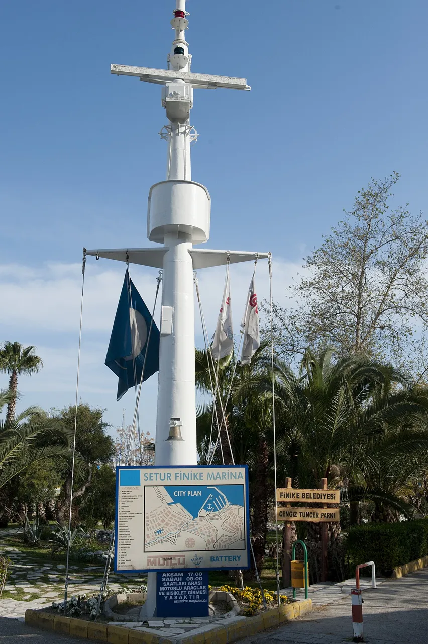 Signal mast and town plan at Setur Finike Marina