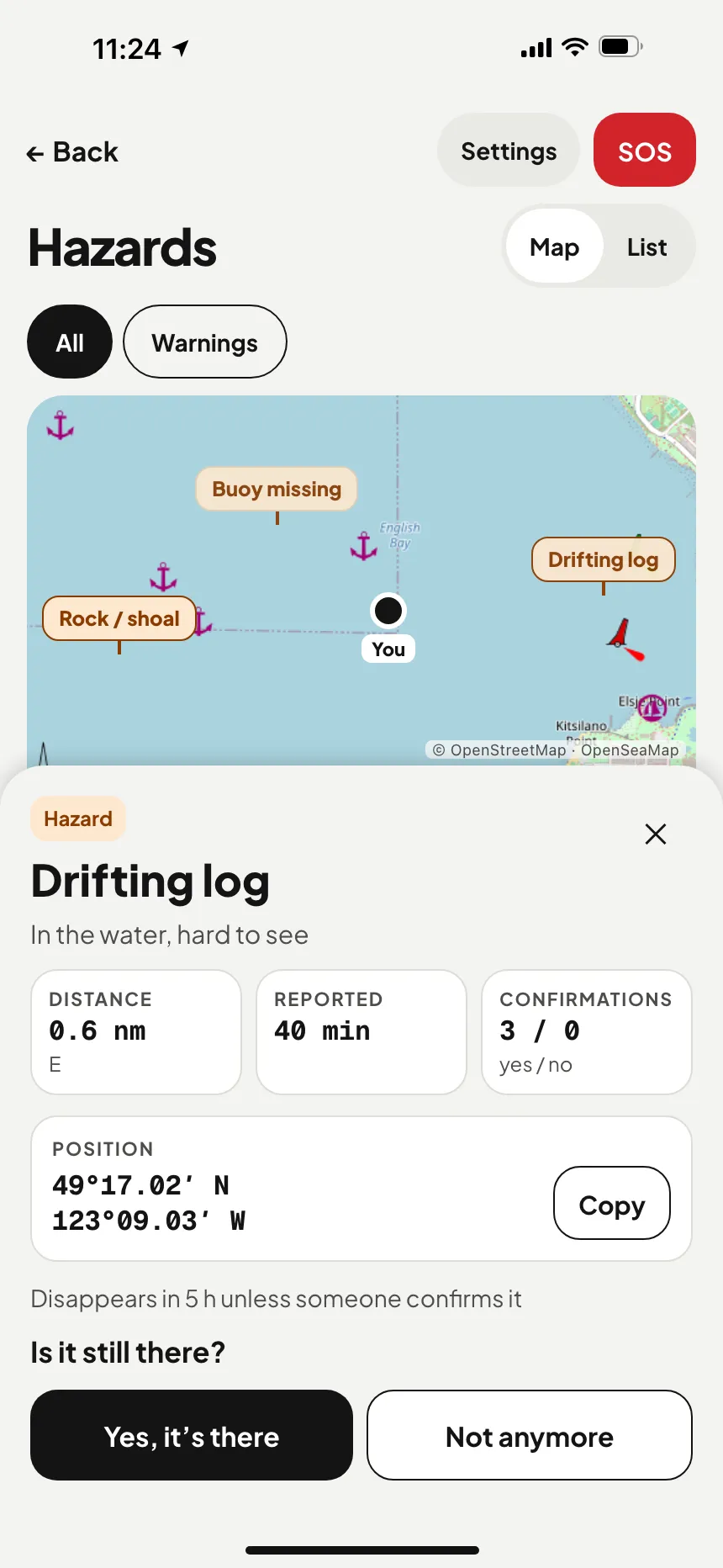 Boating hazard reports: a drifting log, a missing buoy and a rock reported by boaters near you; the log's position and confirmations · VesselSOS